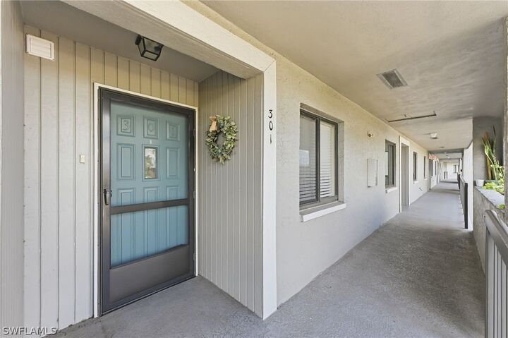 Property Photo:  5725 Gage Lane E301  FL 34113 