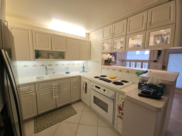 Property Photo:  1225 NW 21st Street 19-1911  FL 34994 