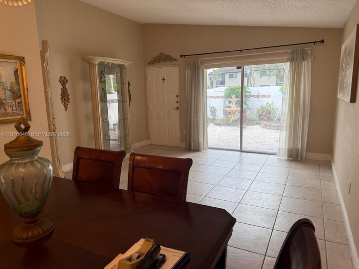 Property Photo:  15390 SW 76th Ter 105  FL 33193 