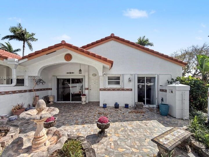 Property Photo:  15390 SW 76th Ter 105  FL 33193 