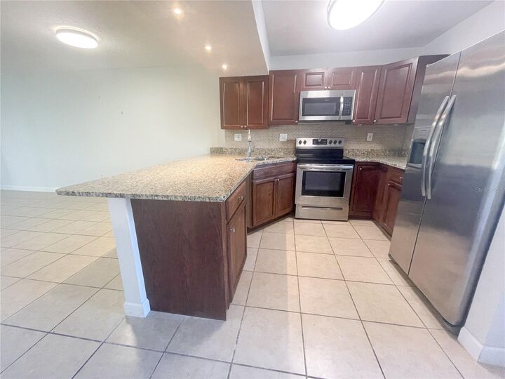 Property Photo: 2625 State Road 590 1211 FL 33759