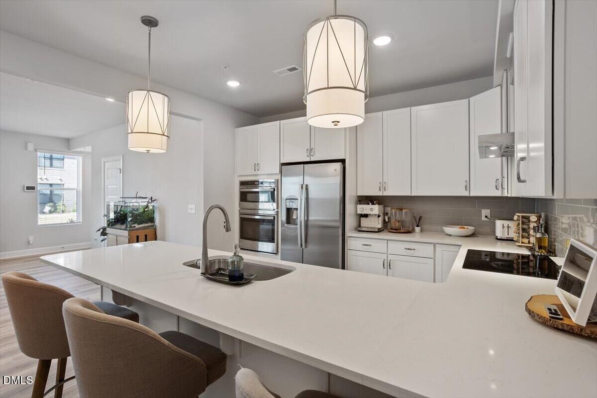 Property Photo:  1234 Coach Station Alley 101  NC 27601 