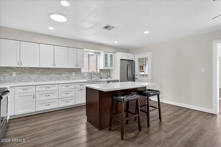 Property Photo:  8725 E Jackrabbit Road  AZ 85250 