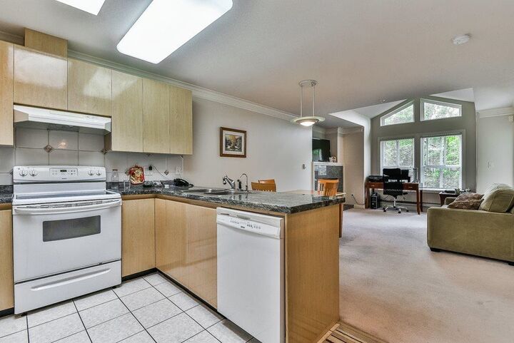 Property Photo: 8115 121A Street 404 BC V3W 1J2
