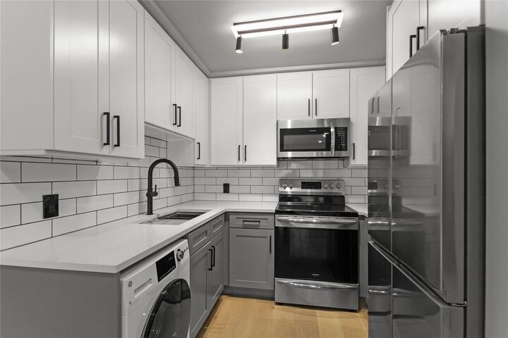 1948 Coquitlam Avenue 201 — photo 1