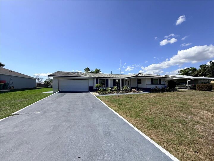 Property Photo: 1629 Birchcrest Boulevard FL 33952