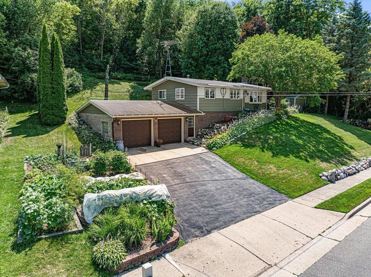 Property Photo:  295 Hartford Rd  WI 53086 