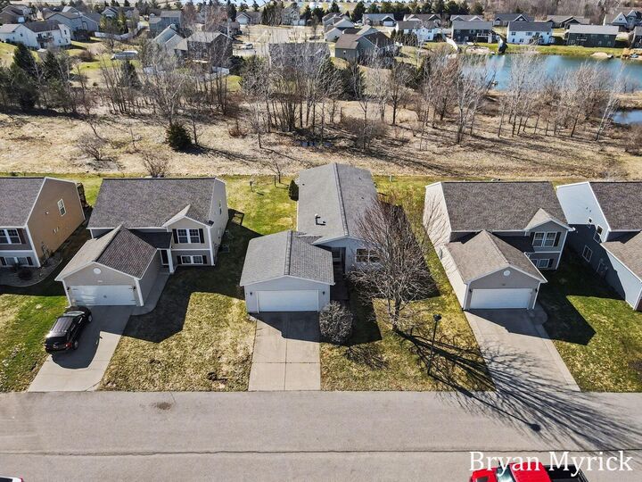 Property Photo:  6589 Moss Lake Drive  MI 49426 