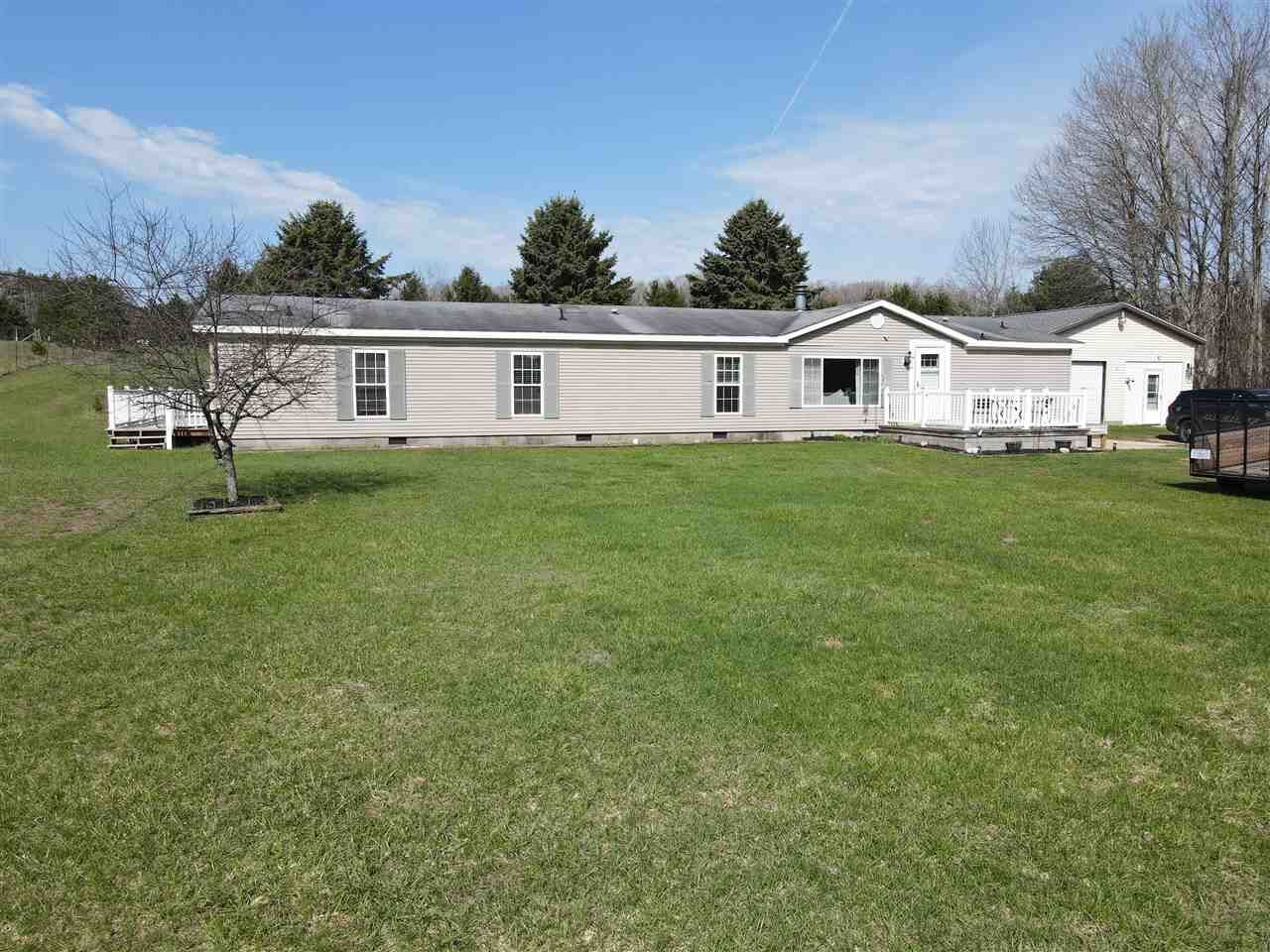 Property Photo:  305 Advance  MI 49727 