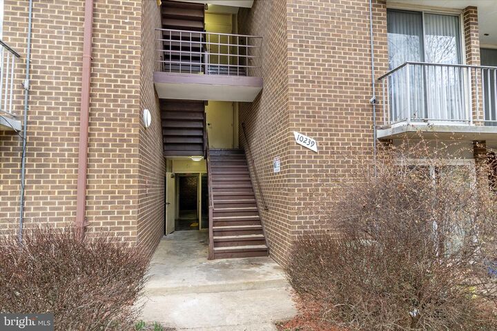 Property Photo:  10239 Prince Place 26-102  MD 20774 