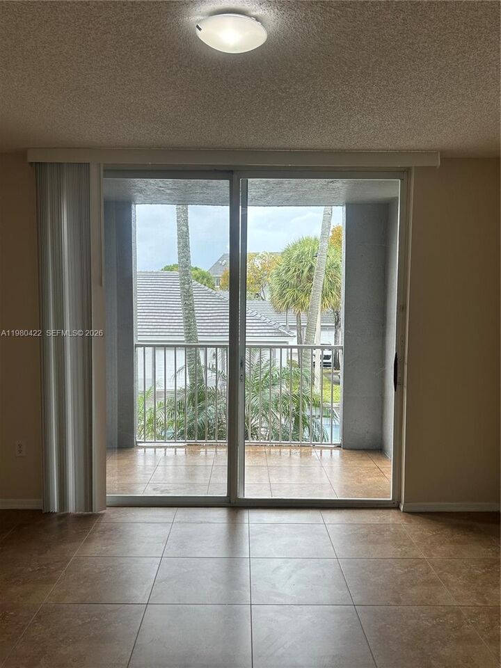 Property Photo:  11177 SW 8th St 204  FL 33025 