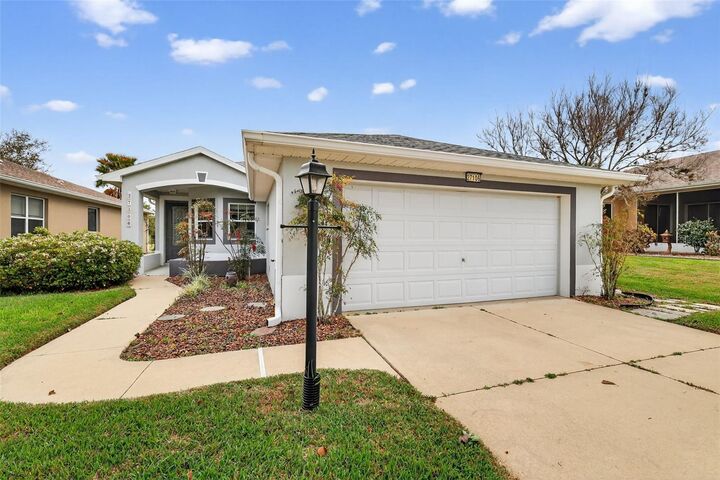 Property Photo: 27106 Greenfly Orchid Lane FL 34748