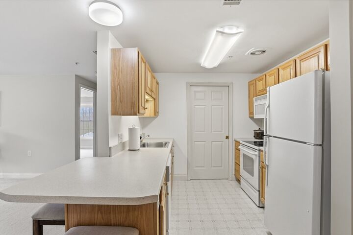 Property Photo:  10 Vista Ridge Drive 2  NH 03053 