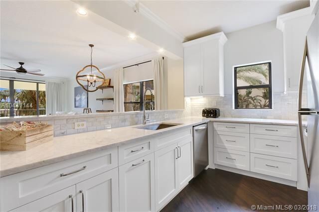 Property Photo:  100 Uno Lago Drive 205  FL 33408 