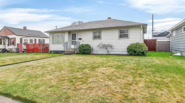 Property Photo:  114 E Sanson Ave  WA 99207 