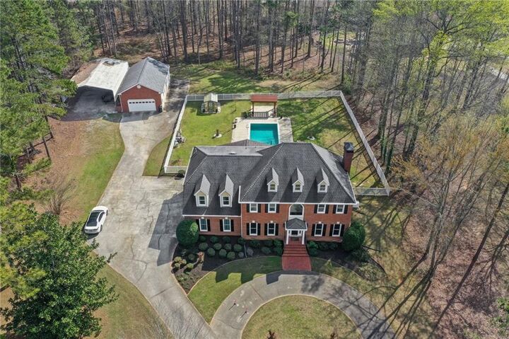 Property Photo:  1975 Old Lost Mountain Road  GA 30127 