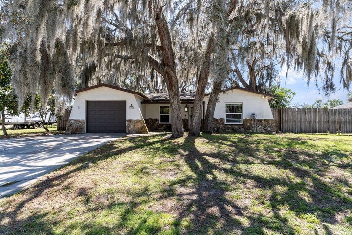 Property Photo:  6732 Pomander Avenue  FL 34653 