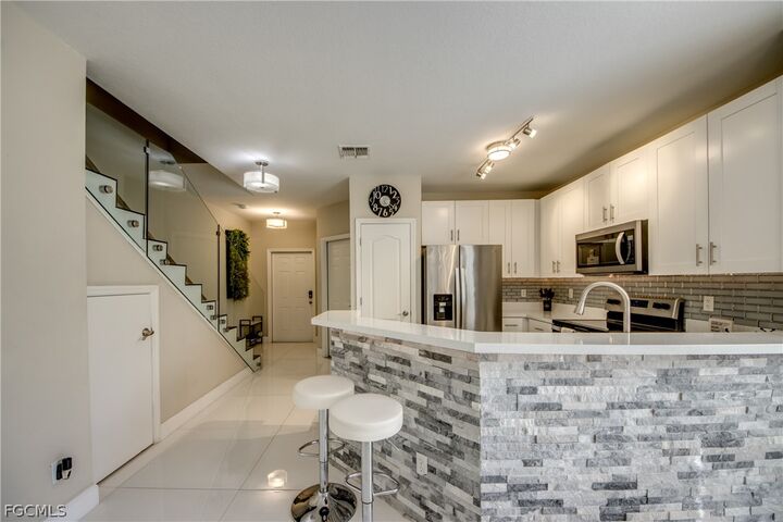 Property Photo:  8531 Athena Court  FL 33971 