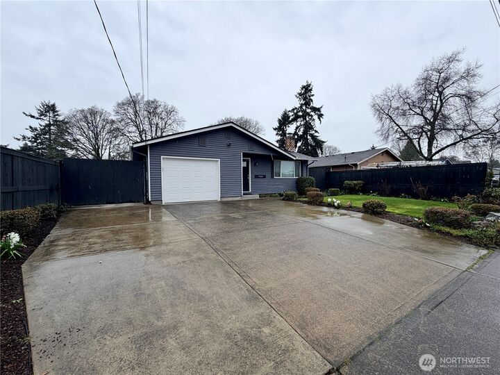 Property Photo:  7110 S Madison Street  WA 98409 