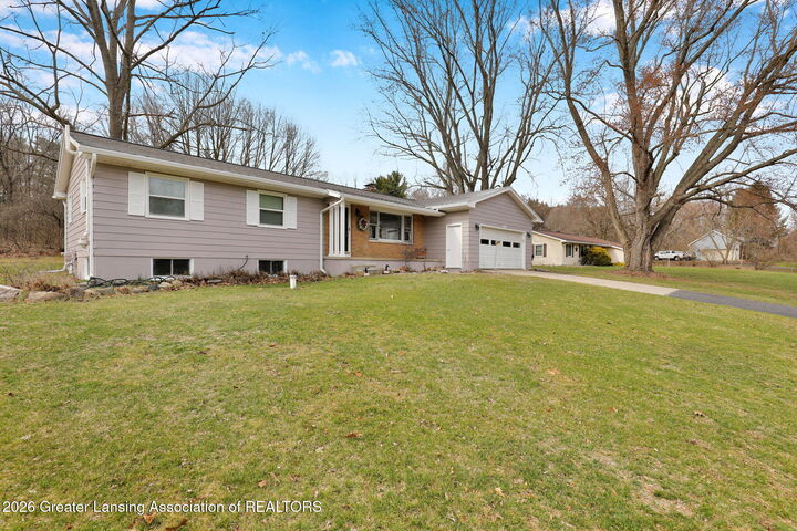 Property Photo:  4529 Sandstone Drive  MI 48895 