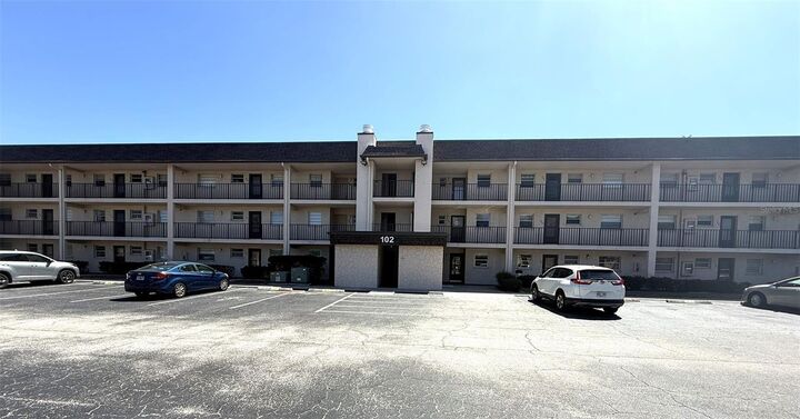 Property Photo: 102 Capri Isles Boulevard 306 FL 34292