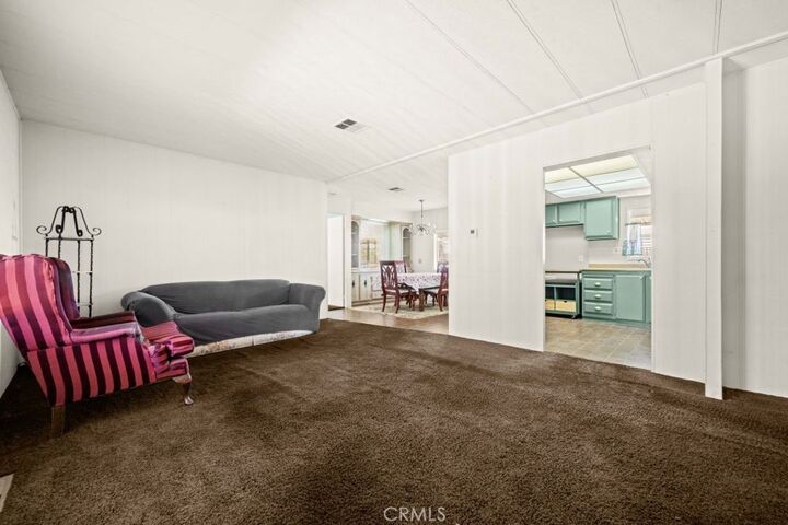 Property Photo:  6741 Lincoln 15  CA 90620 