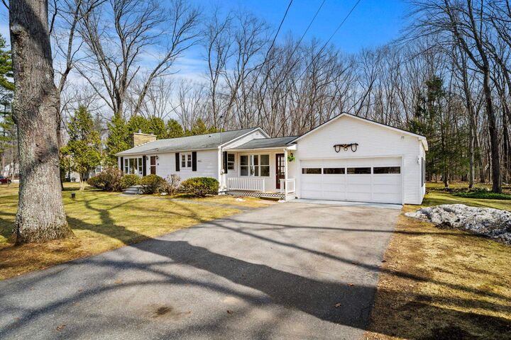 Property Photo:  53 Seaverns Bridge Road  NH 03031 