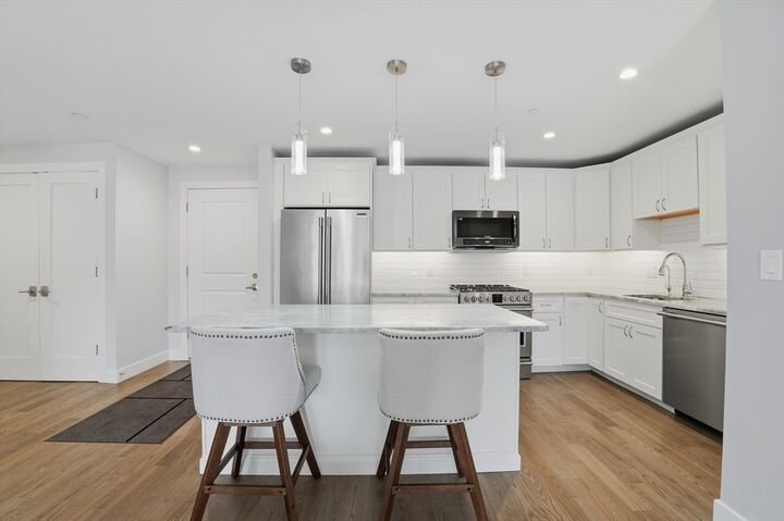 Property Photo:  9 Independence Ave 102  MA 02184 