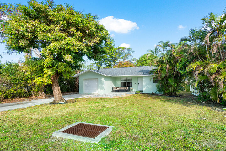 Property Photo:  411 SW 1st Avenue  FL 33435 
