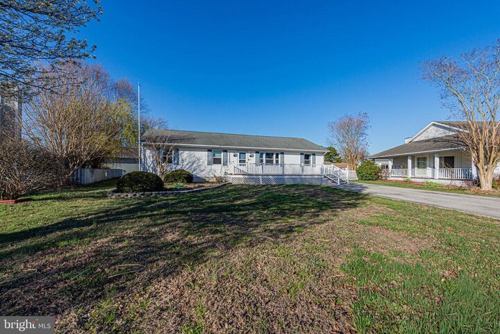 Property Photo: 37725 E Pond Circle DE 19975