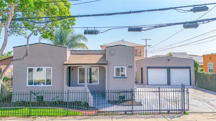 Property Photo:  8110 S Denker  CA 90047 