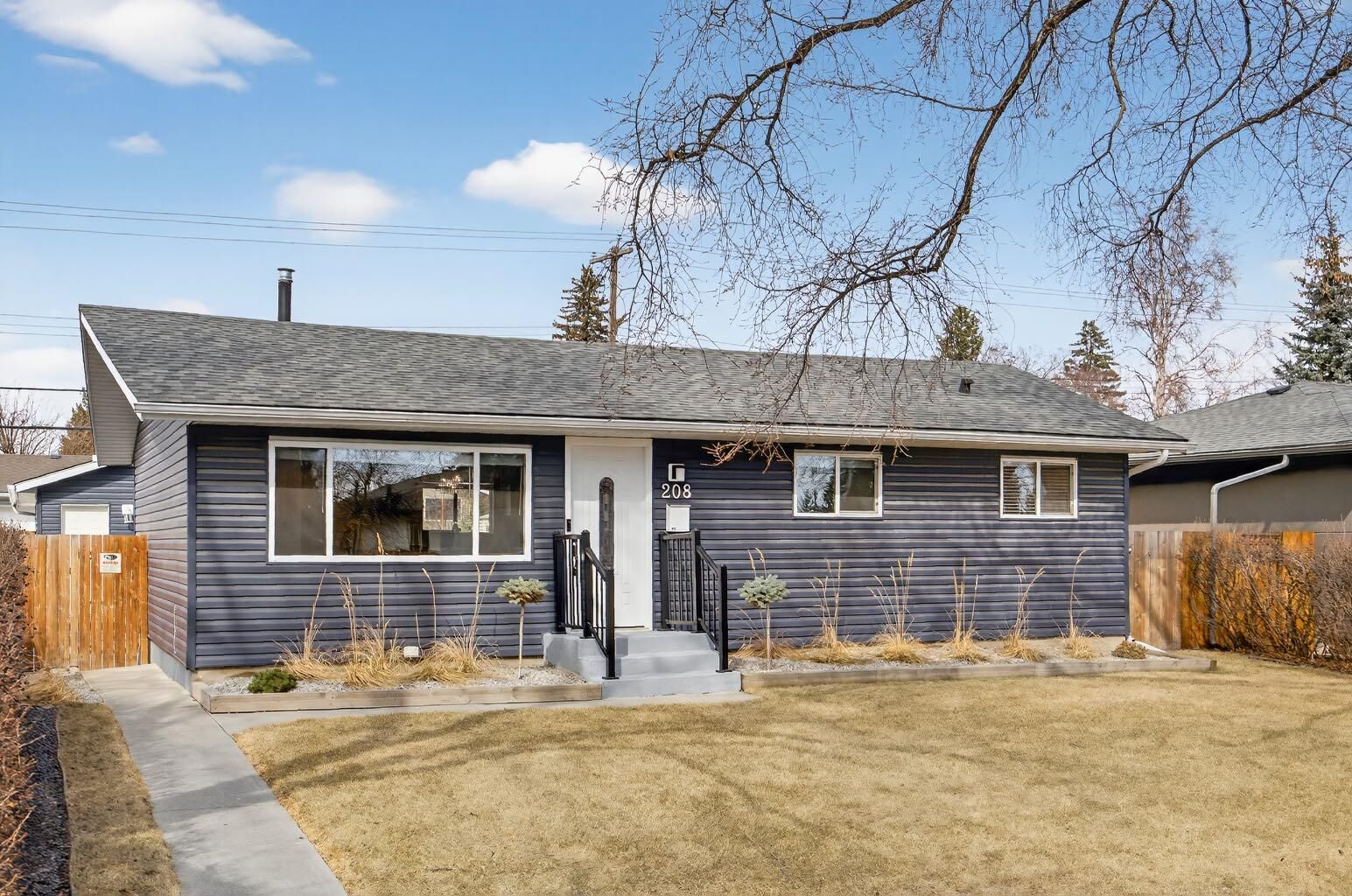Property Photo:  208 78 Avenue SE  AB T2H 1C4 