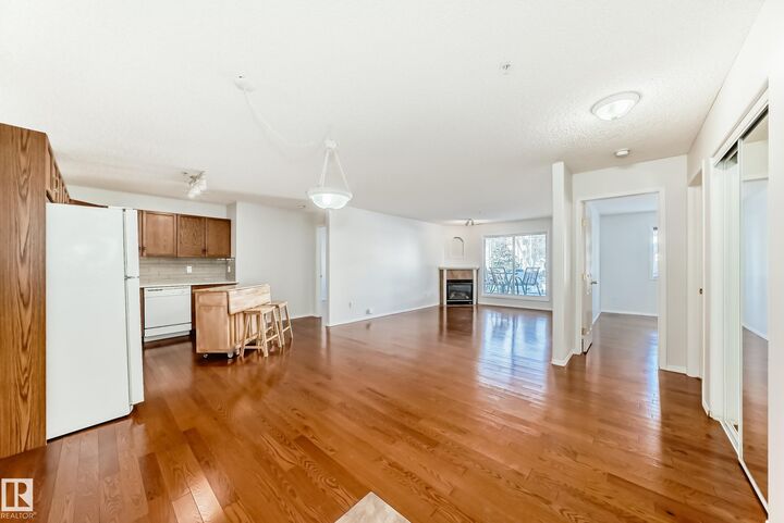 Property Photo:  16303 95 Street NW 105  AB T5Z 3V1 