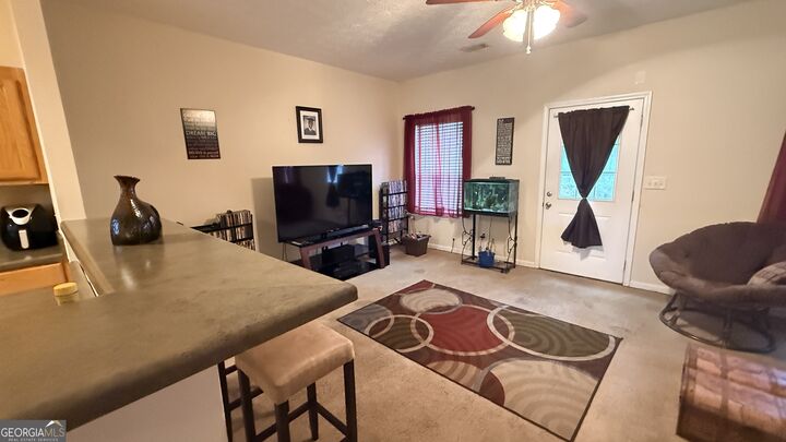 Property Photo:  6317 Ellenwood Drive  GA 30273 