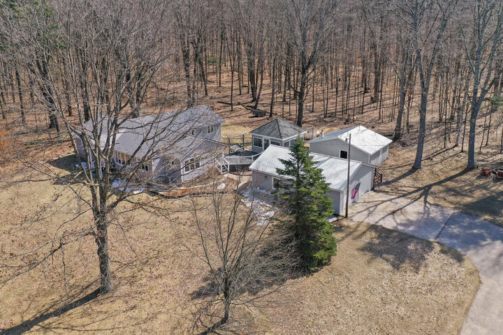 Property Photo:  10319 E 4 1/2 Mile Road  MI 49656 