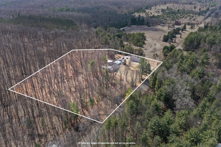 Property Photo:  10319 E 4 1/2 Mile Road  MI 49656 