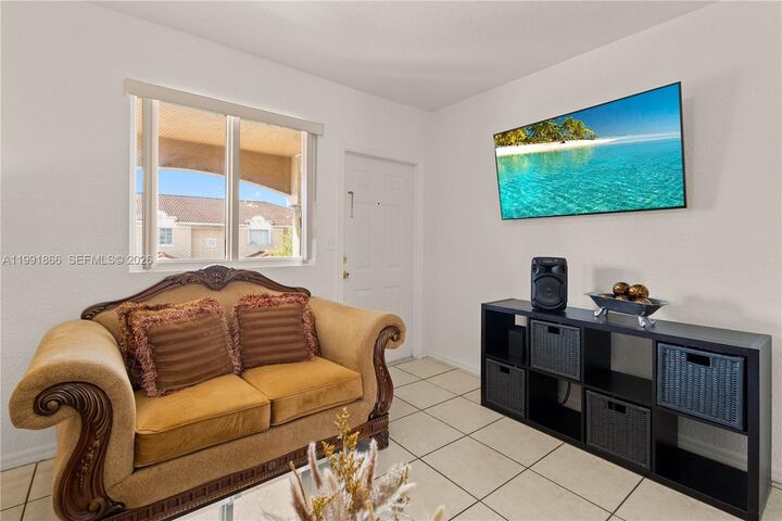 Property Photo:  317 E 3rd St 201  FL 33010 