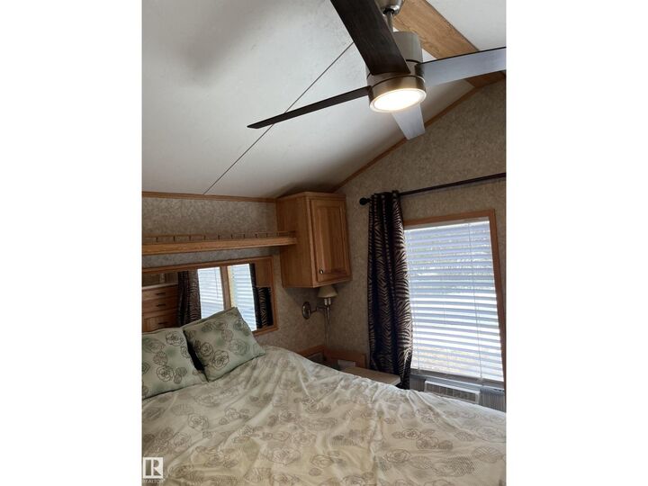 Property Photo:  1030 35468 Range Road 30  AB T4G 0M3 