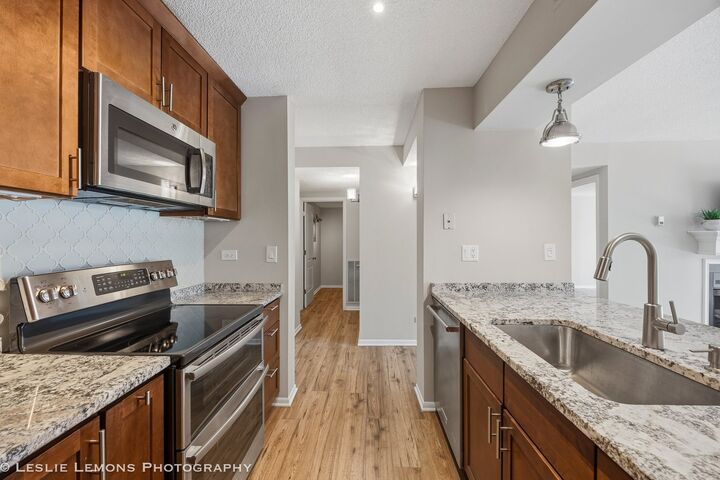 Property Photo:  511 Aurora Avenue 313  IL 60540 