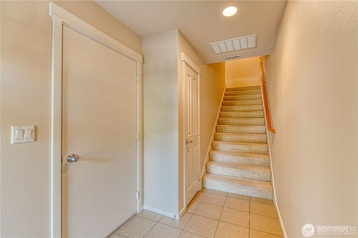 Property Photo:  5583  Lakemont Boulevard SE 1603  WA 98006 