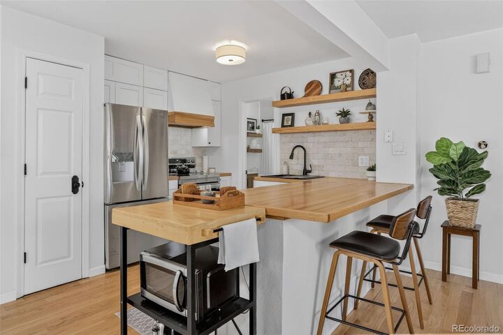 Property Photo:  886 S Reed Court E  CO 80226 