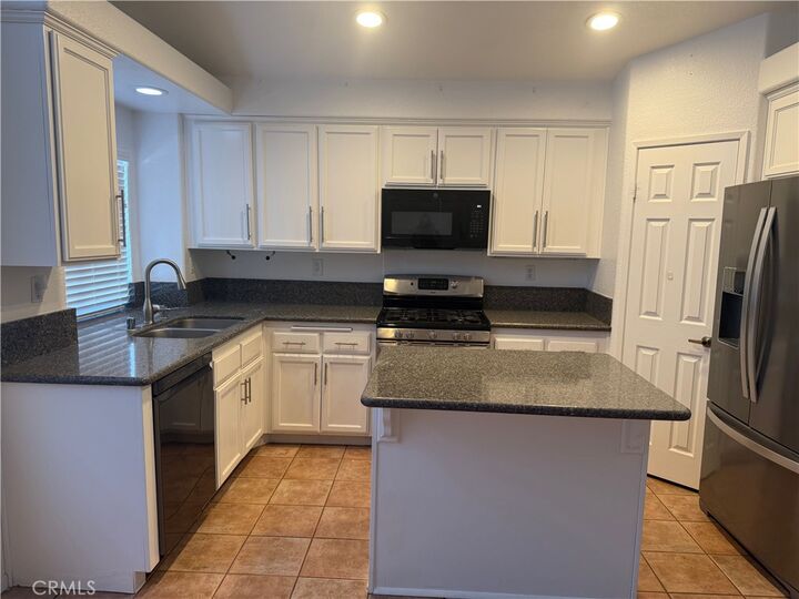 Property Photo:  1250 Granite  CA 92543 