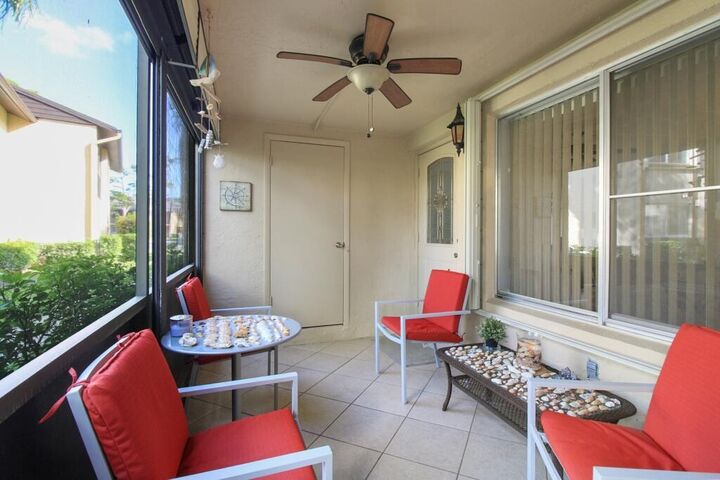 Property Photo:  407 Pine Glen Lane C-1  FL 33463 