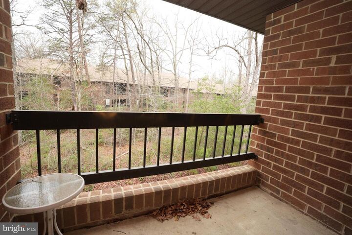 Property Photo:  23239 Rosewood Court A-11  MD 20619 