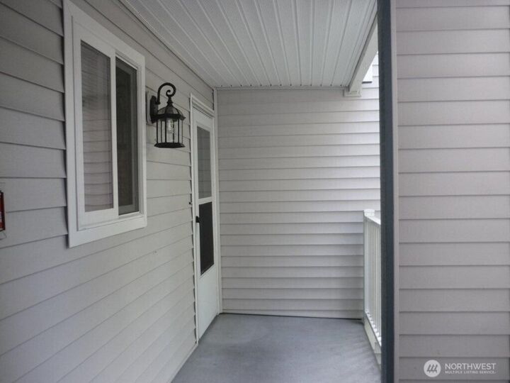 Property Photo:  12720 NE 10th Place D 202  WA 98007 