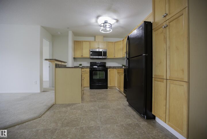 Photo de la propriété:  50 Woodsmere Cl 233  AB T8L 4N9 