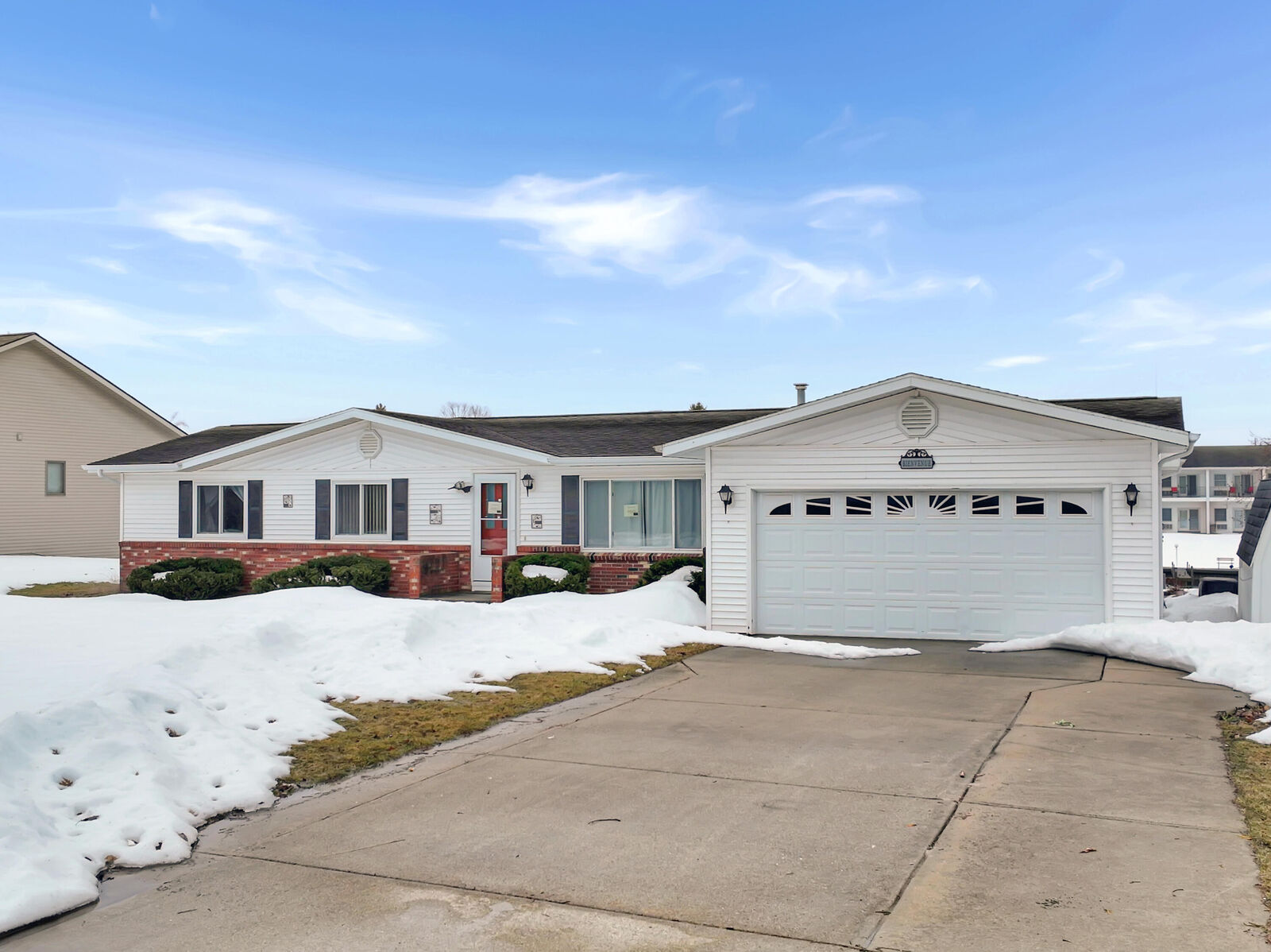 Property Photo:  216 Riverside Drive  MI 49721 