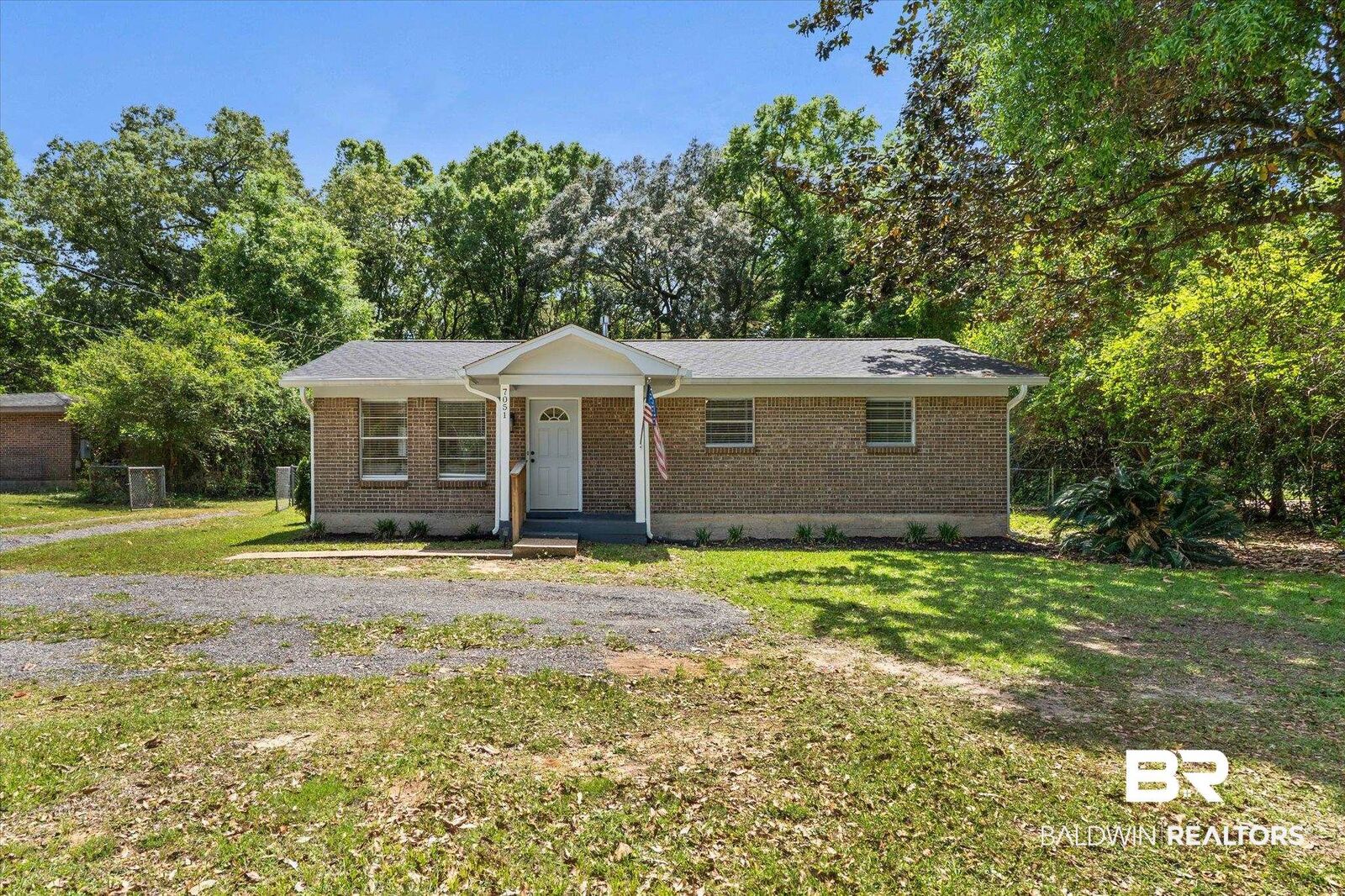 Property Photo: 7051 Cambridge Drive AL 36619