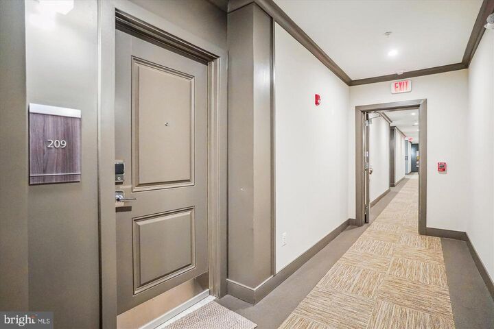 Property Photo:  102 Saint Ives Place 209  MD 20745 