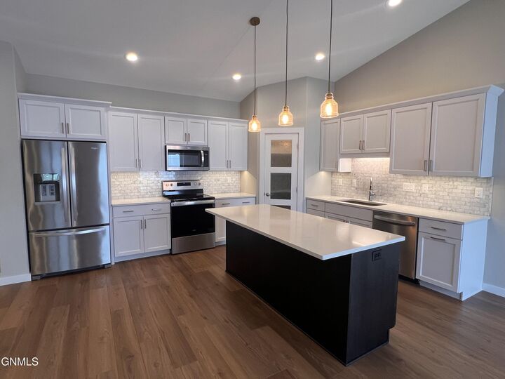 Property Photo: 221 Colt Avenue ND 58503